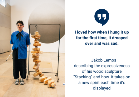 Phoenix College art students Jakob Lemos with his sculpture "Stacking" during an Vanguard Showcase at the Phoenix Art Museum