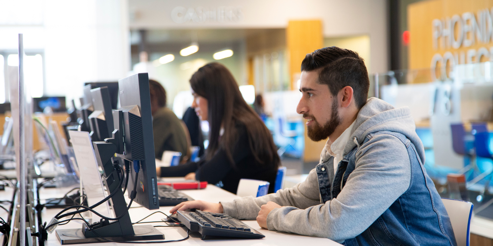 Students at computers in the Welcome Center