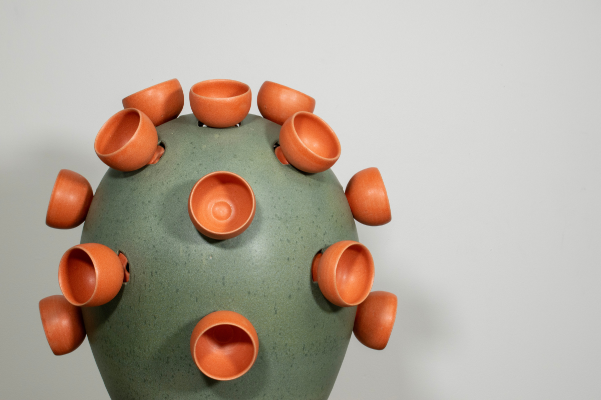 Green Orb with orange saucers