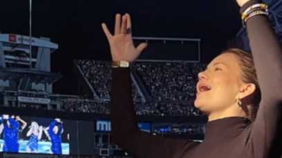 Jillian Deaton, a Phoenix College alumna and ASL interpreter at night one of Taylor Swift's "The Eras Tour" serving as a conduit for communication between the Deaf and Hard of Hearing and hearing parties