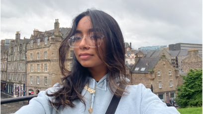 Phoenix College student Ashley Aguilera stands outside Edinburgh Castle in Scotland during her study abroad experience. 