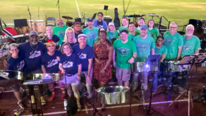 Guest artist and esteemed pannist Dr. Josanne Francis stand wtih other steel pan performers on Hoy Stadium during 4th Annual Pan Groove Rising Festival
