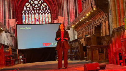 Phoenix College alumna Julie Rake is on a TEDx stage in Scotland's Paisley Abbey giving her talk "Can Love Heal What Divides Us?" 