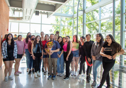 Phoenix College faculty Anil Kapoor stands with his Biology students