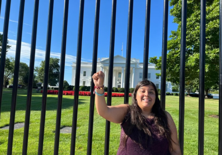 Pheonix College graduate Ivonne Dominguez standing in front of the White House in Washington DC