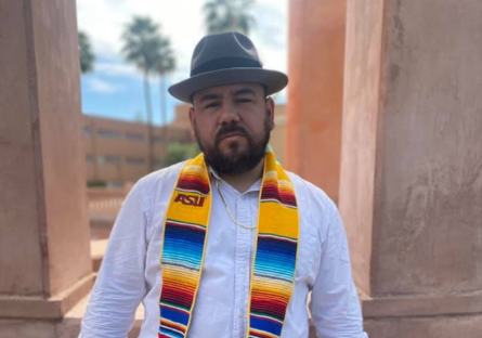 Phoenix College alumnus and transfer student to ASU Francisco Garcia wearing his ASU sarape graduation stole
