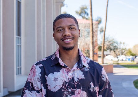 Phoenix College student and Black Student Union President Javyn Booth stands outside the Library on campus