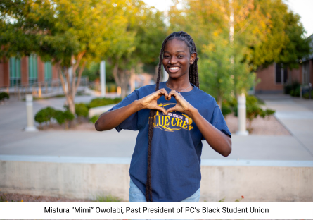 Past President of Phoenix College's Black Student Union Mistura "Mimi" Owolabi makes a heart with her hands on campus