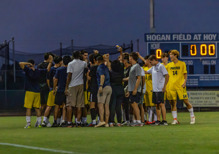 Phoenix College Men's Soccer Team huddles to celebrate their No. 1 ranking in the nation for eight-consecutive weeks
