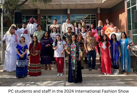 Phoenix College students and staff in the International Fashion Show wearing traditional clothing from their country
