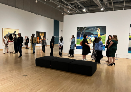 Guests attend the opening of Eric Fischl's solo exhibition "Stories Told" at the Phoenix Art Museum