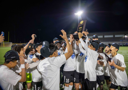 Phoenix College Men's Soccer team celebrates after winning the National championship