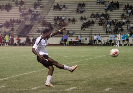 Phoenix College (PC) alumnus Martin Luala playing midfield during a game agains Glendale in 