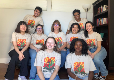 Olina is on the far left in a group of nine Phi Theta Kappa regional officers