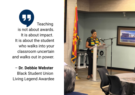 Dr. Debbie Webster stand behind a podium giving a speech at the Black History Month Legacy Luncheon; quote: "Teaching is not about rewards. It is about impact. It is about the student who walks into your classroom uncertain and walks out in power." 