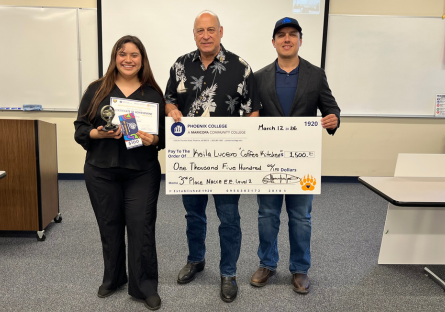 Keila Lucero stands with her 3rd place award and certificate while judges Fidel Atencio and Cesar Salas stand next to her holding the oversize check for $1500