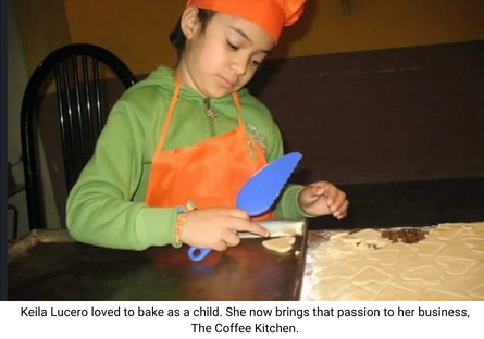 Keila Lucero as a young baker, wearing a green shirt, orange apron and orange chef's hat cutting out heart shapes in the flat dough in front of her. 