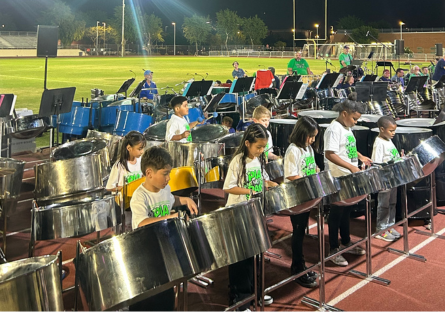 Phoenix International Academy (PIA) Pan Stars, one of the first groups to perform, had second graders give their premiere performance, with enthusiastic applause and audience participation. 