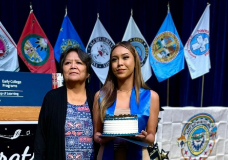 Alyssa posing with her grandmother at the Native American Convocation Ceremony
