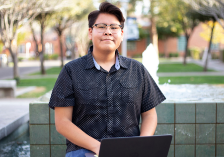 Student on laptop in Sophomore Square - Phoenix College