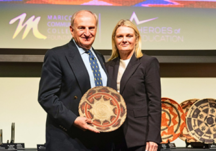 Peter Banko poses with PC President, Dr. Britt at Heroes of Education event