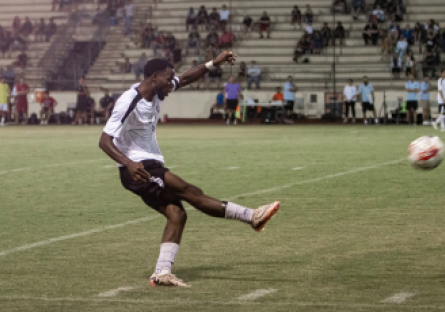 Phoenix College (PC) alumnus Martin Luala playing midfield during a game agains Glendale in 