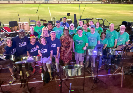 Guest artist and esteemed pannist Dr. Josanne Francis stand wtih other steel pan performers on Hoy Stadium during 4th Annual Pan Groove Rising Festival