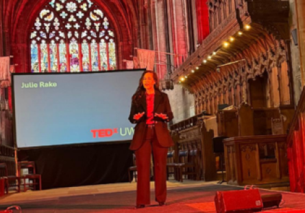 Phoenix College alumna Julie Rake is on a TEDx stage in Scotland's Paisley Abbey giving her talk "Can Love Heal What Divides Us?" 