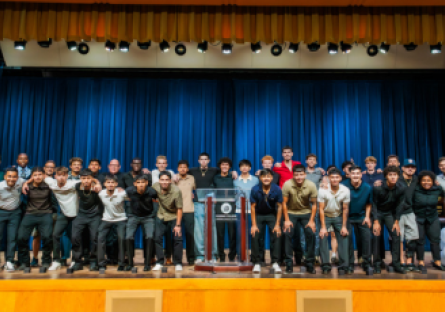 Phoenix College's 2025 Men's Soccer team pose for a picture on the Bulpitt stage after the ceremony celebrating their historic national championship win