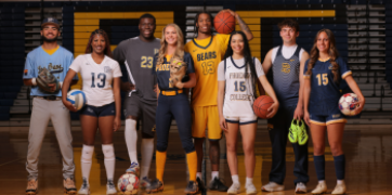 Eight student athletes representing the various teams on campus - posing inside the gym